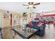 Open living room showcases stylish decor and comfortable furniture at 10448 Hetrick W Cir, Largo, FL 33774
