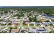 An aerial view of a charming neighborhood with lush green trees at 12933 90Th Ave, Seminole, FL 33776