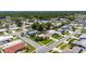 An aerial view of a charming neighborhood with lush green trees at 12933 90Th Ave, Seminole, FL 33776