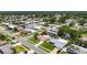 An aerial view that showcases the neighborhood's layout, the lush greenery, and the community's amenities at 12933 90Th Ave, Seminole, FL 33776