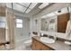 Well-maintained bathroom with a tiled shower and bathtub combination, with ample counter space at 12933 90Th Ave, Seminole, FL 33776