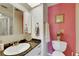 Well-maintained bathroom featuring sink with granite top and an updated toilet at 12933 90Th Ave, Seminole, FL 33776