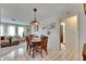 Charming dining area offering seamless flow into the living room, ideal for entertaining guests at 12933 90Th Ave, Seminole, FL 33776