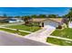 Charming home with well-kept lawn and front garden, set back from the street with a private driveway at 12933 90Th Ave, Seminole, FL 33776