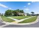 Corner lot home featuring a spacious lawn, mature trees, and traditional architecture in a residential area at 12933 90Th Ave, Seminole, FL 33776
