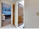 Hallway view into the bedroom providing a sense of space and connection within the home at 12933 90Th Ave, Seminole, FL 33776