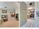 Open-concept living area showcasing a seamless transition to the dining space and kitchen beyond at 12933 90Th Ave, Seminole, FL 33776