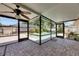 Inviting screened patio with brick flooring and a view of the refreshing outdoor pool at 12933 90Th Ave, Seminole, FL 33776