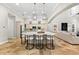 Open floor plan featuring a gourmet kitchen with center island flowing into the living area at 1600 Magnolia Rd, Belleair, FL 33756