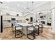 Spacious open-concept kitchen and living space with a large island and plenty of room for entertaining at 1600 Magnolia Rd, Belleair, FL 33756