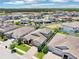 An aerial view showcasing the neighborhood setting and home's location at 1741 Cherry Walk Rd, Lutz, FL 33558