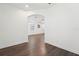 A view into the Main Bedroom with dark hardwood floors at 1741 Cherry Walk Rd, Lutz, FL 33558