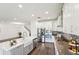 Gourmet kitchen with a large island, stainless steel appliances, and ample cabinet space at 1741 Cherry Walk Rd, Lutz, FL 33558