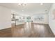 Bright, open living space featuring modern finishes, seamless flow to the kitchen, and ample natural light at 1741 Cherry Walk Rd, Lutz, FL 33558