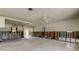 Unfinished living room with ceiling fan and sliding glass doors at 179 85Th N Ave, St Petersburg, FL 33702