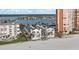 Stunning aerial view of condos along a pristine beach, highlighting the perfect blend of coastal living and relaxation at 17960 Gulf Blvd # 225, Redington Shores, FL 33708