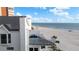 Balcony view overlooking a sunny beach with blue skies and an oceanfront vista at 17960 Gulf Blvd # 225, Redington Shores, FL 33708