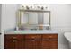 Bathroom featuring a double vanity with marble countertop and classic design at 17960 Gulf Blvd # 225, Redington Shores, FL 33708