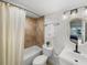 This bathroom is complete with tile surround, shower, and tile flooring at 17960 Gulf Blvd # 225, Redington Shores, FL 33708