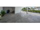 Spacious carport providing ample parking, featuring a glimpse of the outdoors at 17960 Gulf Blvd # 225, Redington Shores, FL 33708