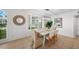 Cozy dining area with large bay window providing lots of natural light at 17960 Gulf Blvd # 225, Redington Shores, FL 33708