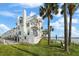 Beachfront townhomes with lush lawn and palms offering stunning ocean views at 17960 Gulf Blvd # 225, Redington Shores, FL 33708