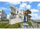 Beautiful white beachside condo with multiple balconies, offering stunning ocean views and convenient beach access at 17960 Gulf Blvd # 225, Redington Shores, FL 33708