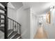 Hallway with spiral staircase and closet at 17960 Gulf Blvd # 225, Redington Shores, FL 33708