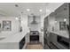 Contemporary kitchen with stainless steel appliances, bar seating, and lots of counter space at 17960 Gulf Blvd # 225, Redington Shores, FL 33708