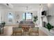 Well-lit living room showing comfortable seating and a serene beach view at 17960 Gulf Blvd # 225, Redington Shores, FL 33708