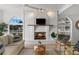 Bright living room featuring a fireplace and plenty of natural light at 17960 Gulf Blvd # 225, Redington Shores, FL 33708