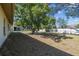 Spacious backyard featuring mature trees, a tire swing and privacy fence at 2071 Linwood Ave, Spring Hill, FL 34608
