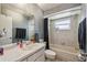 Bathroom featuring a shower-tub combo, gray paint, vanity with a white sink at 2071 Linwood Ave, Spring Hill, FL 34608