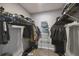 Walk-in closet with ample shelving and hanging space for clothes and shoes at 2071 Linwood Ave, Spring Hill, FL 34608