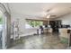 Versatile living space features tile flooring, natural light, and potential for various uses at 2071 Linwood Ave, Spring Hill, FL 34608