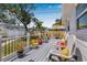 Large outdoor deck with seating, ideal for enjoying the backyard at 2134 6Th N Ave, St Petersburg, FL 33713