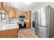 Bright kitchen boasts stainless steel appliances and plenty of cabinet space at 2134 6Th N Ave, St Petersburg, FL 33713