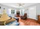 Living room with hardwood floors, natural light, and comfortable seating arrangement at 2134 6Th N Ave, St Petersburg, FL 33713