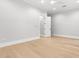Bright bedroom featuring hardwood floors, recessed lighting, and neutral colors at 220 Hesperides N St, Tampa, FL 33609