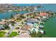 Exclusive waterfront community with luxurious homes, private docks, and stunning water views from above at 2233 Donato Dr, Belleair Beach, FL 33786