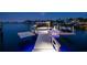 Private boat dock with boat and jet ski lifts offering waterfront access for endless recreational opportunities at 2233 Donato Dr, Belleair Beach, FL 33786