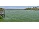 View of intercoastal waterway, mangroves, and upscale residential houses at 2233 Donato Dr, Belleair Beach, FL 33786