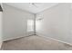 Empty bedroom with carpet, a window, and neutral walls, ready to be personalized at 23935 Coral Ridge Ln, Land O Lakes, FL 34639