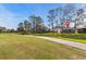 Charming home situated on a picturesque lot with mature trees and a well-manicured lawn at 23935 Coral Ridge Ln, Land O Lakes, FL 34639