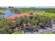 Beautiful condo with red tile roof, lush landscaping, and convenient parking in a golf course community at 2400 Feather Sound Dr # 735, Clearwater, FL 33762