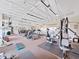 Fitness center with gym equipment and large windows at 2400 Feather Sound Dr # 735, Clearwater, FL 33762