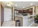 Kitchen features granite countertops, stainless steel appliances and lots of storage at 2400 Feather Sound Dr # 735, Clearwater, FL 33762