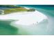 Stunning aerial view of a white sand beach and clear turquoise waters at 2700 Bayshore Blvd # 511, Dunedin, FL 34698