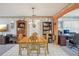 Inviting dining room features tile flooring, desk space, and natural light at 2702 Ochatilla Rd, Holiday, FL 34691
