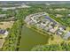 Community aerial view showcasing the neighborhood's lakes, lush landscaping, and residential homes at 2803 130Th E Ave, Parrish, FL 34219